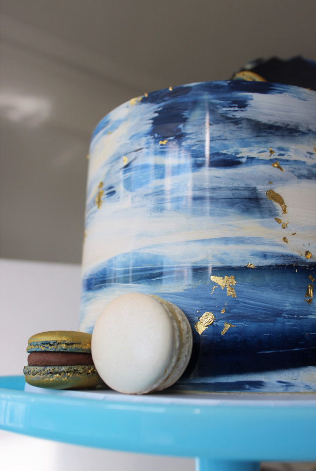 Painted blue marble and gold macaron birthday cake