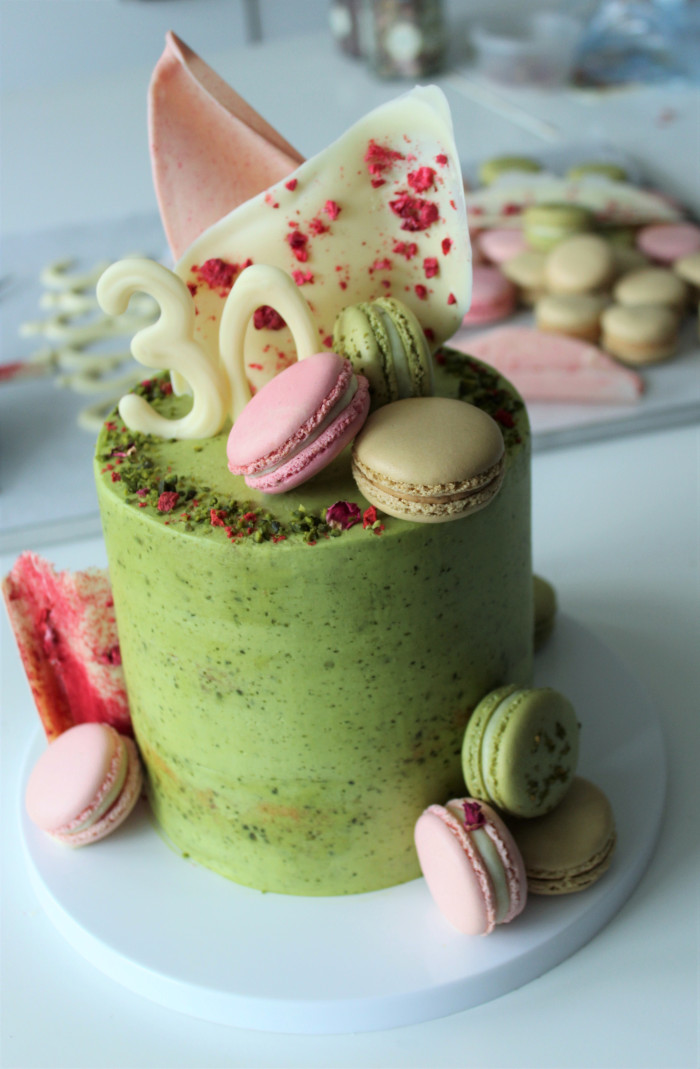 Pistachio, rose and strawberry 30th cake with macarons